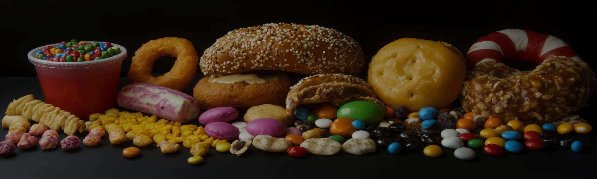 Delicious assortment of candies, cookies, and chocolates at Utsav Market, perfect for celebrations a.